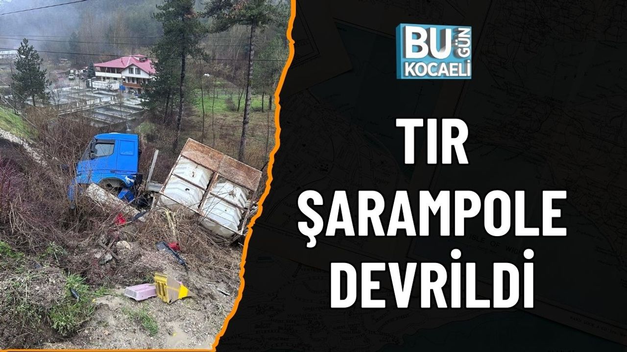 TIR ŞARAMPOLE DEVRİLDİ