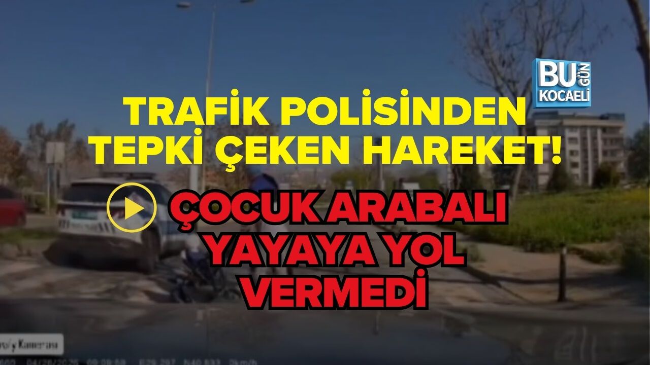 TRAFİK POLİSİNDEN TEPKİ ÇEKEN HAREKET! ÇOCUK ARABALI YAYAYA YOL VERMEDİ