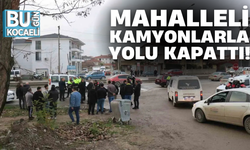 MAHALLELİ KAMYONLARLA YOLU KAPATTI!