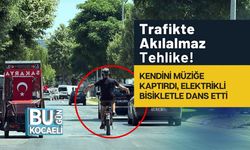 Trafikte Akılalmaz Tehlike! Kendini Müziğe Kaptırdı, Elektrikli Bisikletle Dans Etti