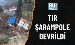 TIR ŞARAMPOLE DEVRİLDİ