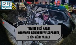 TEM’DE FECİ KAZA: OTOMOBİL BARİYERLERE SAPLANDI, 2 KİŞİ AĞIR YARALI
