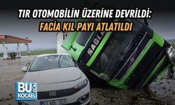 TIR OTOMOBİLİN ÜZERİNE DEVRİLDİ: FACİA KIL PAYI ATLATILDI