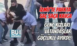 İZMİT'TE PARKTA SAÇ SAÇA KAVGA: GENÇ KIZLARI VATANDAŞLAR GÜÇLÜKLE AYIRDI!