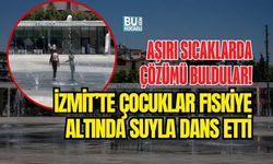 AŞIRI SICAKLARDA ÇÖZÜMÜ BULDULAR! İZMİT’TE ÇOCUKLAR FISKİYE ALTINDA SUYLA DANS ETTİ