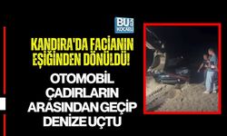 KANDIRA'DA FACİANIN EŞİĞİNDEN DÖNÜLDÜ! OTOMOBİL ÇADIRLARIN ARASINDAN GEÇİP DENİZE UÇTU