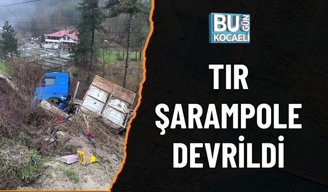 TIR ŞARAMPOLE DEVRİLDİ