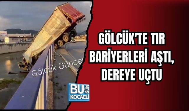 GÖLCÜK'TE TIR BARİYERLERİ AŞTI, DEREYE UÇTU