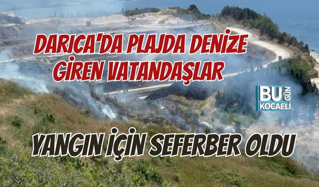 DARICA'DA PLAJDA DENİZE GİREN VATANDAŞLAR YANGIN İÇİN SEFERBER OLDU
